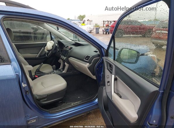 JF2SJAECXHH572707 2017 SUBARU FORESTER Blue Vista interior delantera