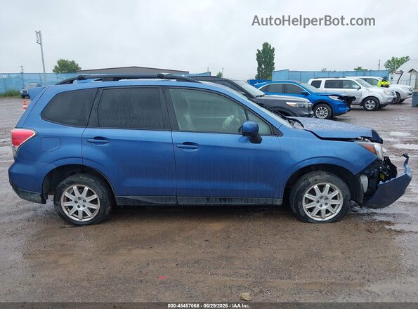 JF2SJAECXHH572707 2017 SUBARU FORESTER Blue Vista interior trasera