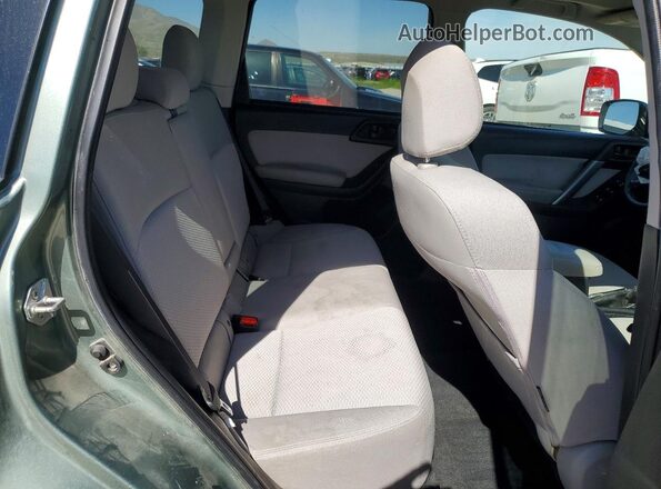 JF2SJAFCXGH463046 2016 SUBARU FORESTER Green Հետևի նստատեղերի տեսք
