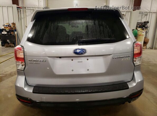 JF2SJAGC0HH570977 2017 SUBARU FORESTER Silver Widok z tyłu