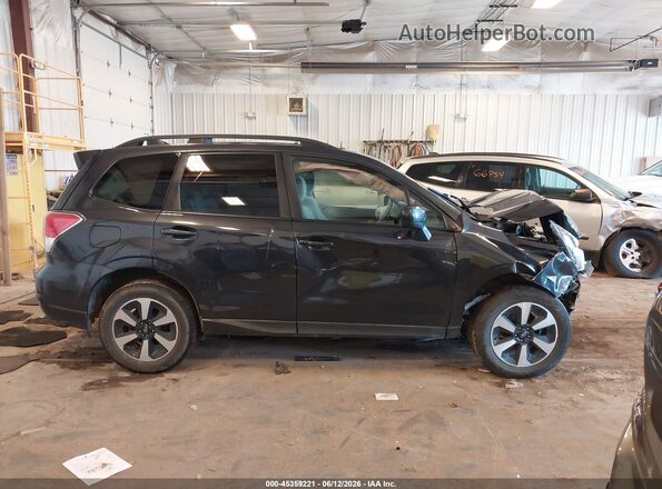 JF2SJAGC2HH501465 2017 SUBARU FORESTER Black Rear interior view