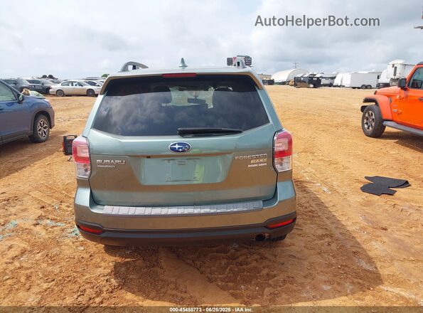 JF2SJAGC2HH579082 2017 SUBARU FORESTER Green 