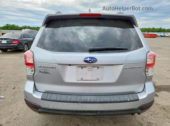 JF2SJAGC3JH617702 2018 SUBARU FORESTER Silver Հետևի տեսք