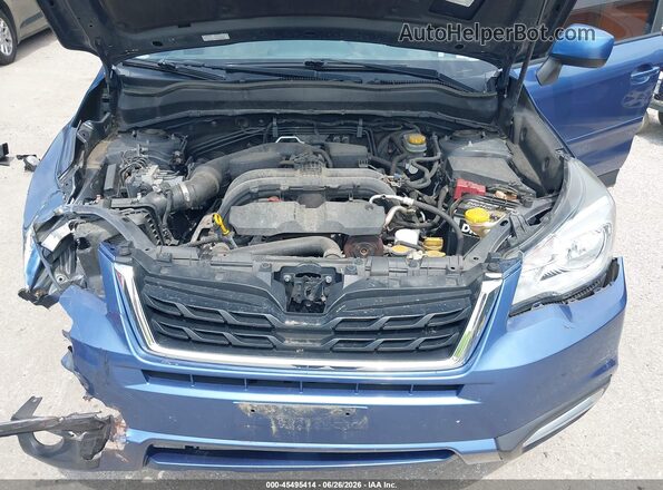 JF2SJAGC4HH556449 2017 SUBARU FORESTER Blue Rear view