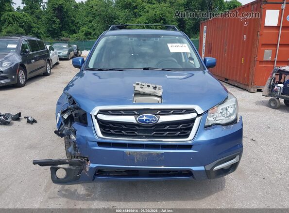 JF2SJAGC4HH556449 2017 SUBARU FORESTER Blue Rear interior view