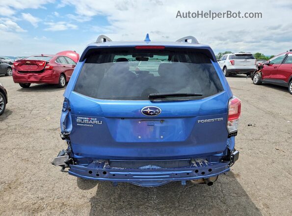 JF2SJAGC4JH548776 2018 SUBARU FORESTER Blue Հետևի տեսք