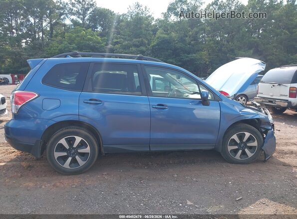 JF2SJAGC5JH605034 2018 SUBARU FORESTER Blue უკანა სალონის ხედი