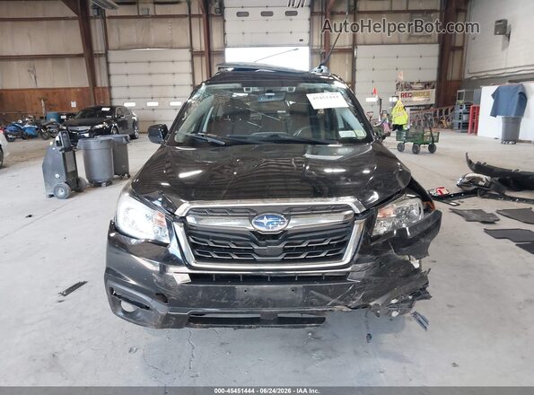 JF2SJAGC6HH800683 2017 SUBARU FORESTER Black Rear interior view