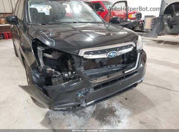 JF2SJAGC9JH585760 2018 SUBARU FORESTER Black Front view