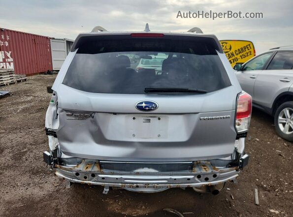 JF2SJAGCXJH558700 2018 SUBARU FORESTER Silver Вид ззаду