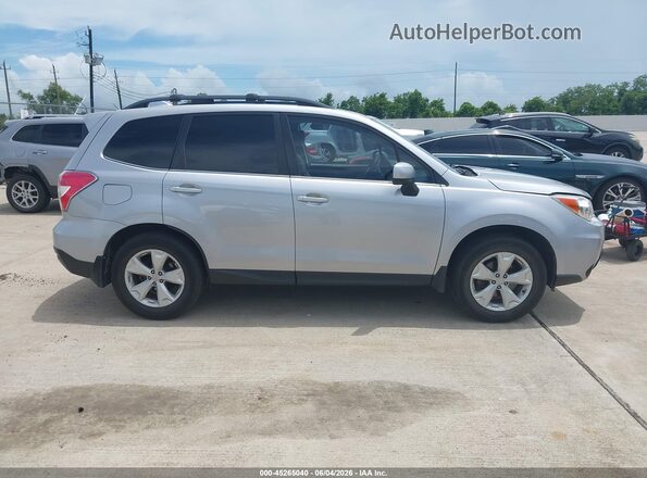 JF2SJAHCXGH510914 2016 SUBARU FORESTER Silver უკანა სალონის ხედი