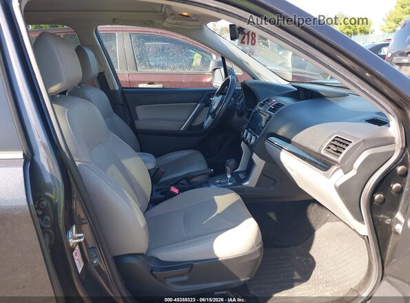 JF2SJAJC5HH451458 2017 SUBARU FORESTER Black Front interior view
