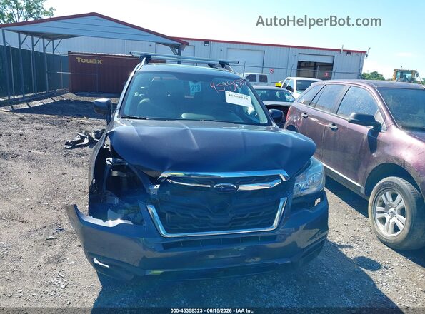 JF2SJAJC5HH451458 2017 SUBARU FORESTER Black Rear interior view