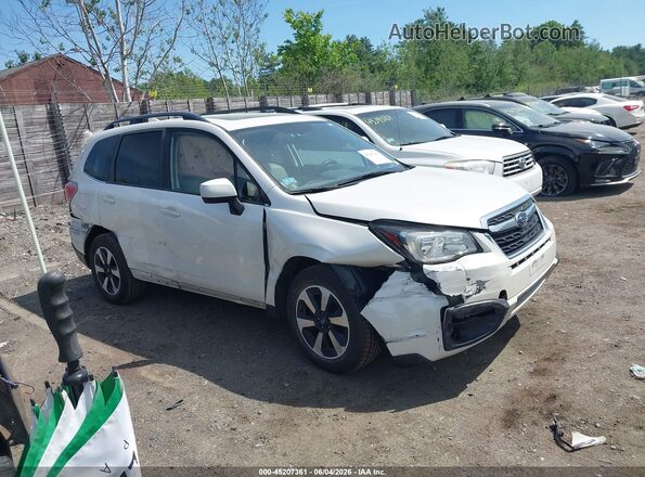 JF2SJAJC5HH471323 2017 SUBARU FORESTER White Rear interior view