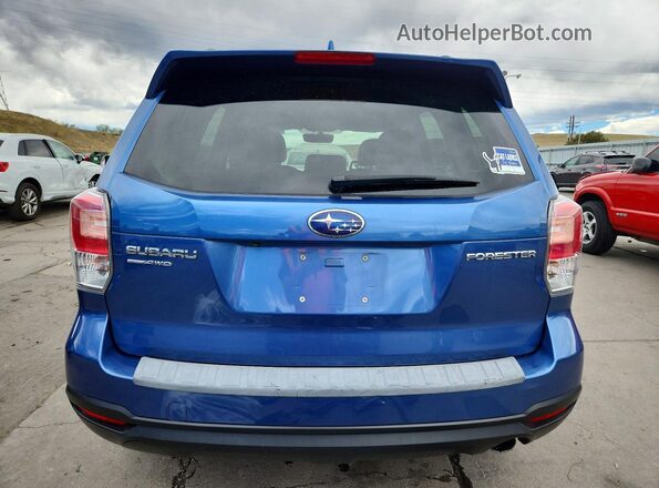 JF2SJAJC7JH415597 2018 SUBARU FORESTER Blue Widok z tyłu