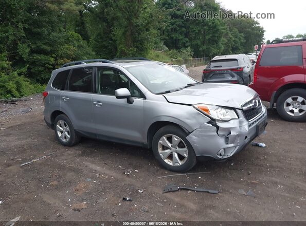 JF2SJAKC6GH561853 2016 SUBARU FORESTER Silver Vista interior trasera
