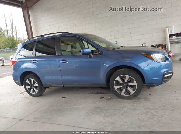 JF2SJARC3HH420407 2017 SUBARU FORESTER Синий Вид задней части салона