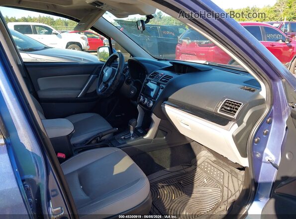 JF2SJARC5HH559681 2017 SUBARU FORESTER Light Blue Front interior view