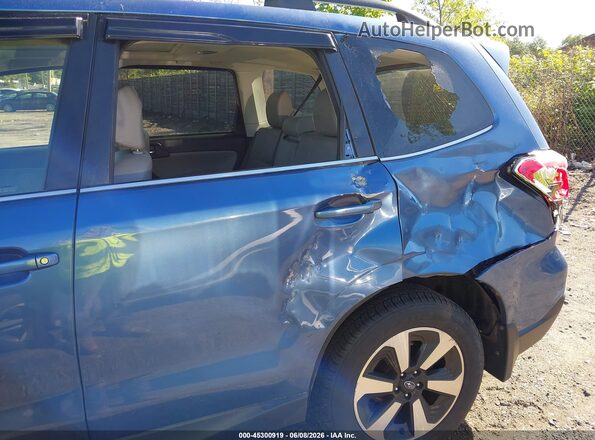 JF2SJARC5HH559681 2017 SUBARU FORESTER Light Blue Front view