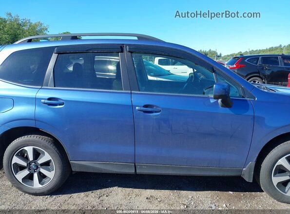 JF2SJARC5HH559681 2017 SUBARU FORESTER Light Blue Rear interior view