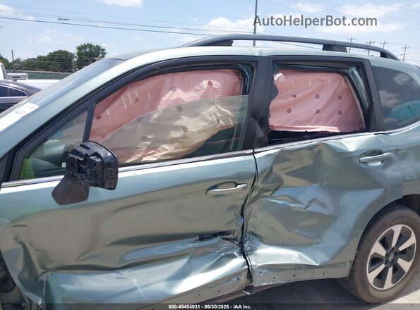 JF2SJARC7JH517812 2018 SUBARU FORESTER Green Vista frontal