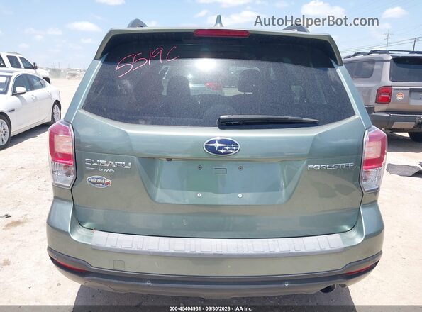 JF2SJARC7JH517812 2018 SUBARU FORESTER Green 