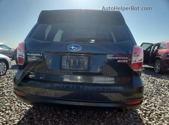 JF2SJAVC9GH442853 2016 SUBARU FORESTER Black Widok z tyłu