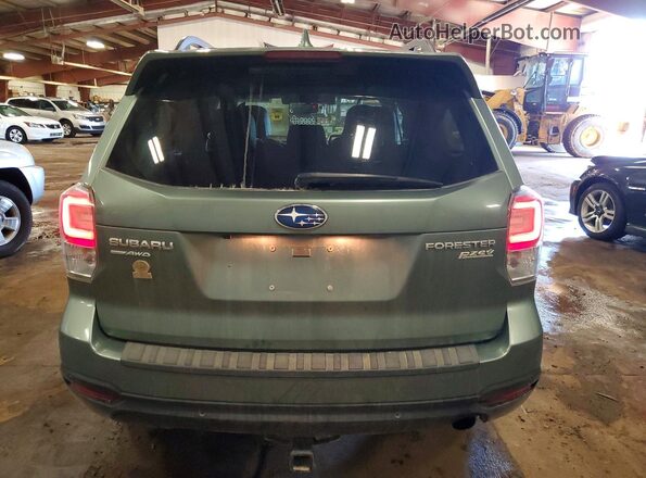 JF2SJAWC7HH478864 2017 SUBARU FORESTER Green Rear view