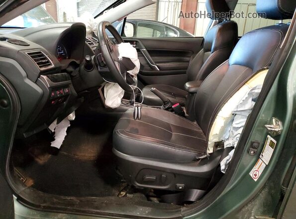 JF2SJAWC7HH478864 2017 SUBARU FORESTER Green Front interior view