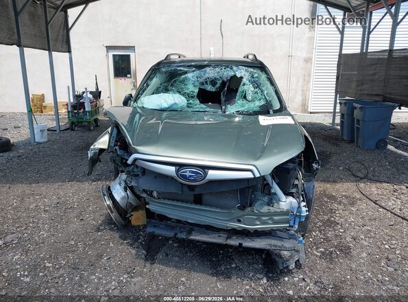 JF2SKACC0KH556698 2019 SUBARU FORESTER Зеленый Вид спереди