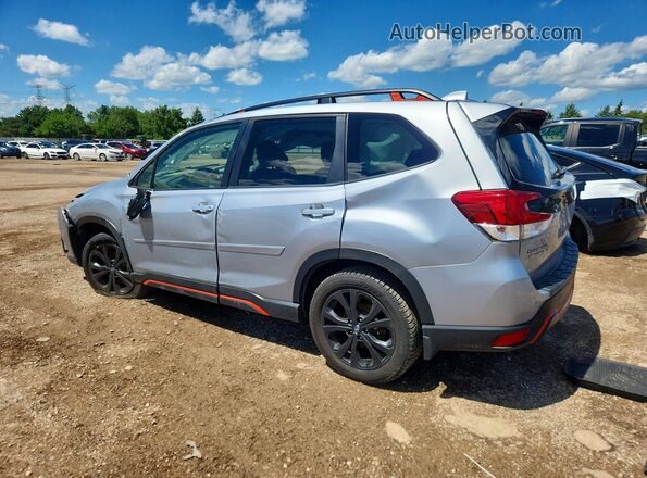 JF2SKAJC0PH458877 2023 SUBARU FORESTER Silver Trasero izquierdo