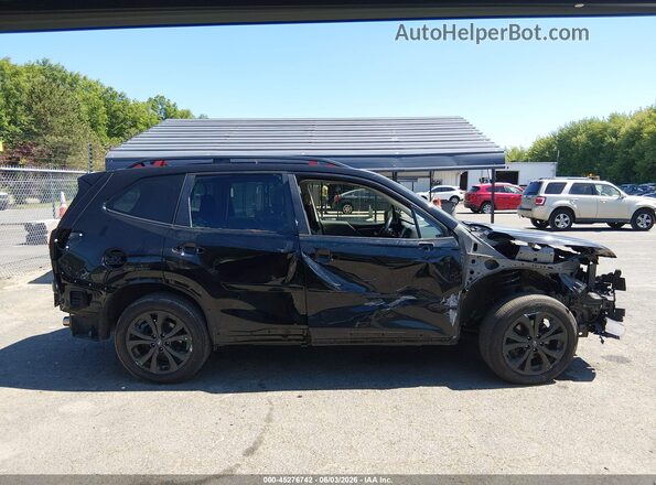 JF2SKAJC9NH475092 2022 SUBARU FORESTER Black Widok wnętrza z tyłu