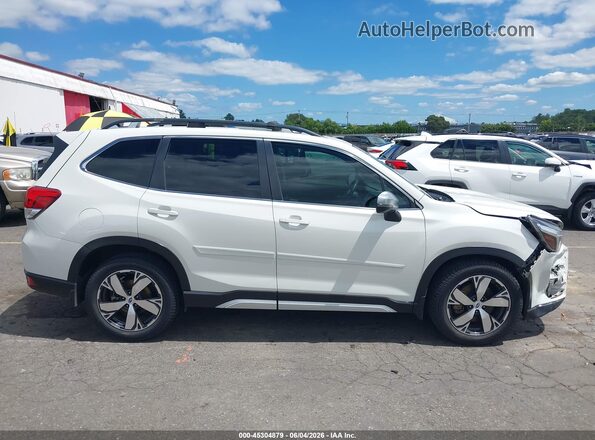JF2SKAXC7LH465634 2020 SUBARU FORESTER White Rear interior view