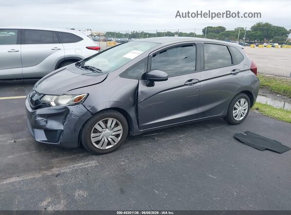 JHMGK5H52GS014467 2016 HONDA FIT Gray Vista tres cuartos delantera izquierda