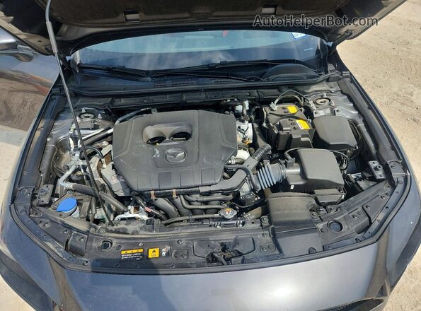 JM1BPAMM5R1719243 2024 MAZDA 3 Gray Vista interior trasera