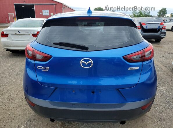 JM1DKBD75G0116092 2016 MAZDA CX-3 Blue Rear view