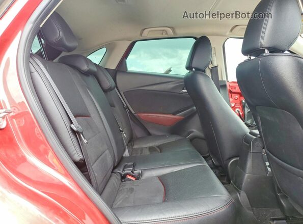 JM1DKBD78G0125501 2016 MAZDA CX-3 Red Vista interior trasera