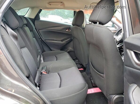 JM1DKDB72M1508628 2021 MAZDA CX-3 Gray Rear seats view