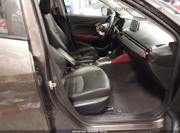 JM1DKDC70G0131774 2016 MAZDA CX-3 Brown Widok wnętrza z przodu