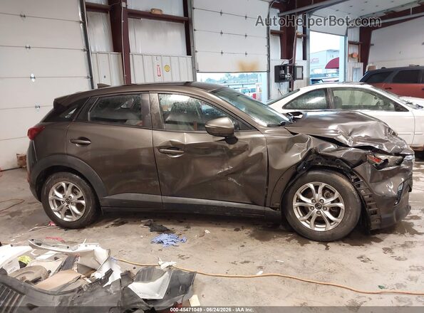 JM1DKDC70G0131774 2016 MAZDA CX-3 Brown Widok wnętrza z tyłu