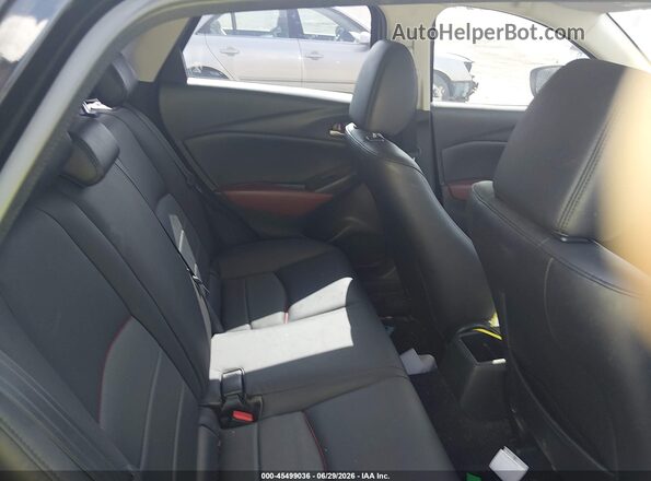 JM1DKDC70J0300196 2018 MAZDA CX-3 Black VIN კოდის სტიკერის ხედი