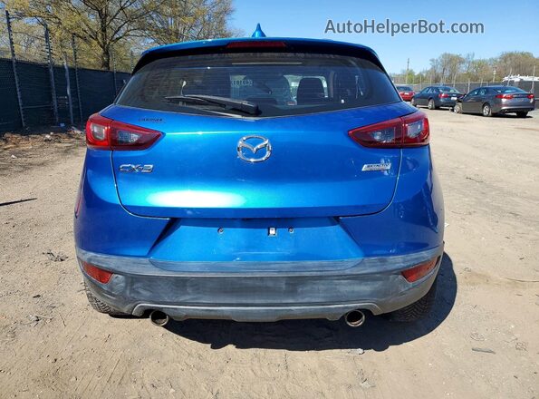 JM1DKDC71H0162680 2017 MAZDA CX-3 Blue Widok z tyłu