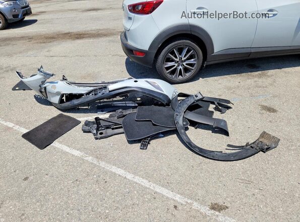 JM1DKDC74J0332391 2018 MAZDA CX-3 Silver VIN sticker view