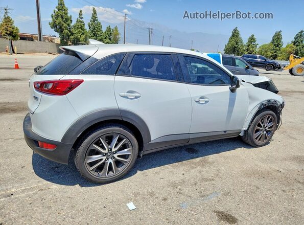 JM1DKDC74J0332391 2018 MAZDA CX-3 Silver Rear right