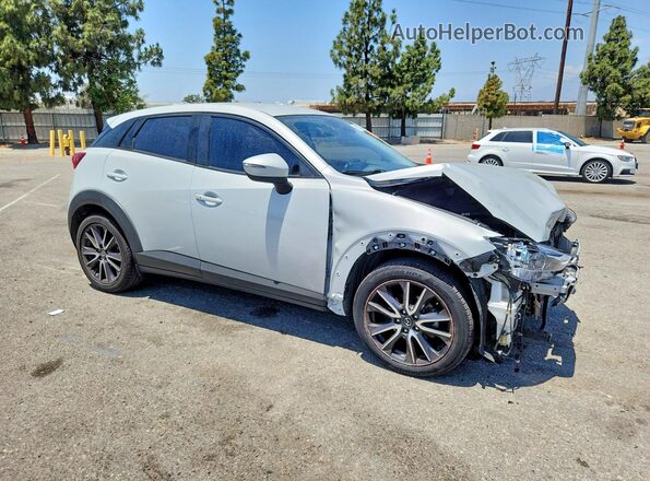 JM1DKDC74J0332391 2018 MAZDA CX-3 Silver Front right