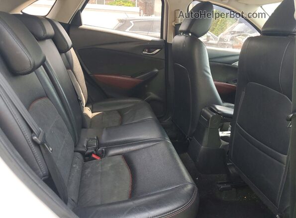 JM1DKDD70G0127481 2016 MAZDA CX-3 Silver Vista interior trasera