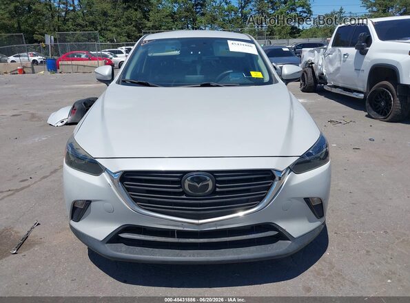 JM1DKFB78M1505597 2021 MAZDA CX-3 Gray Widok wnętrza z tyłu