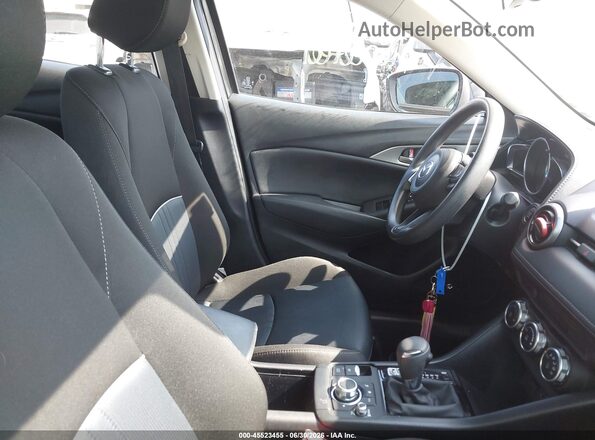 JM1DKFB79M1505124 2021 MAZDA CX-3 Серый Вид салона спереди