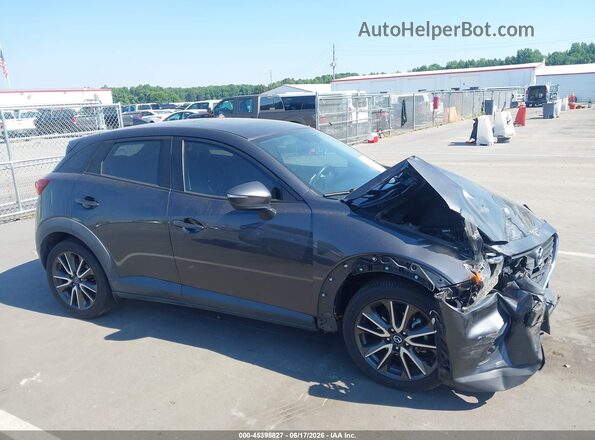 JM1DKFC70H0172970 2017 MAZDA CX-3 Серый Вид задней части салона
