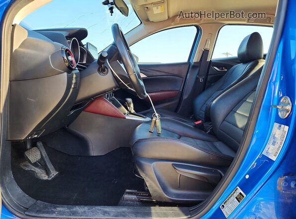 JM1DKFC70H0176310 2017 MAZDA CX-3 Blue Widok wnętrza z przodu